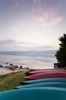 Simple Prints: Canoes and kayaks on the shoreline of Lake Sunapee at sunrise at Mount Sunapee State