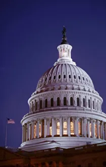 Dennis Brack Prints: the capitol dome at dusk with the light on showing that congress is in session