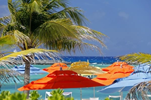 Images Dated 25th March 2012: Caribbean, Bahamas, Castaway Cay. Umbrellas and Shade at Castaway Cay