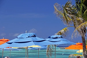 Images Dated 25th March 2012: Caribbean, Bahamas, Castaway Cay. Umbrellas and Shade at Castaway Cay