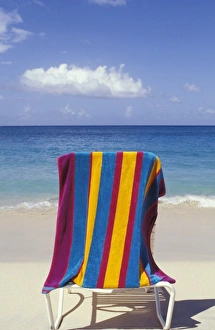 Peter Skinner Prints: Caribbean, Grenada, Grand Anse beach. Beach towel on chair