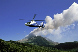 Caribbean, Montserrat, Soufriere Hills. Active volcano and island helicopter