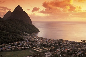 Caribbean, St. Lucia, Soufriere. Sunset view of the Pitons and Soufriere from the NE
