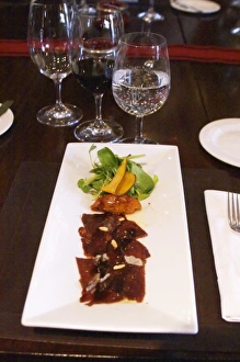Images Dated 24th August 2005: Carpaccio raw marinated beef with pine nuts, mache lettuce, bell pepper, fried pumpkin chips