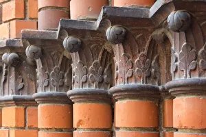 Pillar Prints: Carved red columns in the old town, Riga, Latvia
