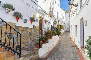 Clear Sky Prints: Casares, Malaga, Andalusia, Spain. A narrow alley in Casares, Andalusia