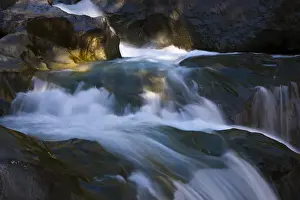Torrential Prints: The cascades of river isel called Umbalfaelle in fall in the national park Hohe Tauern