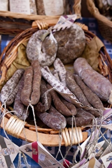 Inti St Clair Prints: Castelnuovo di Garfagnana, Tuscany, Italy - High angle view of a basket of sausages