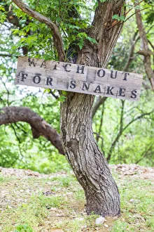 Castroville, Texas, USA. Sign warning snakes in the Texas Hill Country