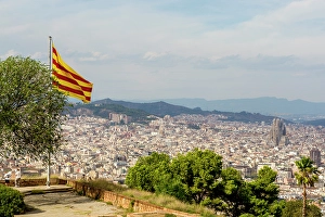 Images Dated 21st June 2024: Catalan flag flies over the Montjuic Castle old military fortress on Montjuic Mountain overlooking the city