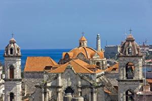 Cathedral and light house in the harbor in the historic center, Havana, UNESCO World Heritage site