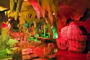 Great Wall Prints: A cave of stalagmites and stalactites lighted with colored lights near the entrance