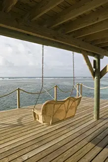 Images Dated 7th February 2006: CAYMAN ISLANDS - CAYMAN BRAC - West End: Brac Reef Beach Resort / Beach Pier Swing