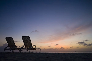 Images Dated 12th April 2007: Cayman Islands, Grand Cayman Island, George Town, Beach chairs along Seven Mile Beach