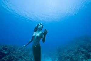 Images Dated 14th April 2007: Cayman Islands, Grand Cayman Island, Underwater view mermaid sculpture in shallow