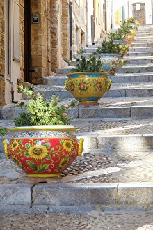 Prints of Cefalu, Sicily. Colorful pots.(Editorial Use Only) Images Dated 2024 December: Cefalu, Sicily. Colorful pots.(Editorial Use Only)