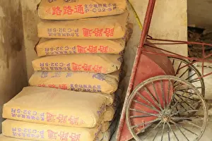 Guangzhou Prints: cement bags & cart, Nanfeng Kiln-oldest kiln in China, Foshan, near Guangzhou China