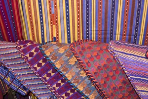 Images Dated 19th January 2008: Central America, Guatemala, Antigua. Colorful weavings for sale in shop in Antigua