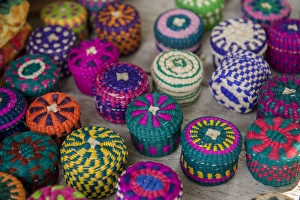 Images Dated 27th April 2010: Central America, Honduras, Roatan, West End Village, colorful woven baskets