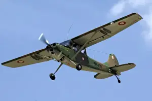 Air Plane Prints: Cessna OE-1 Bird Dog at CAF Air Show showing Maltese markings in the sky