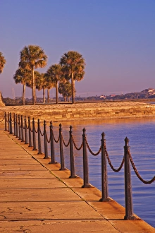 Boardwalk Prints: Chain fence and sidewalk at sunrise St. Augustine, Florida