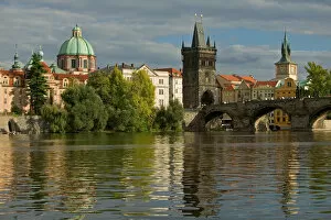 Charles Bridge and Old Town Bridge Tower, dome of the Church of Saint Francis, Vltava River