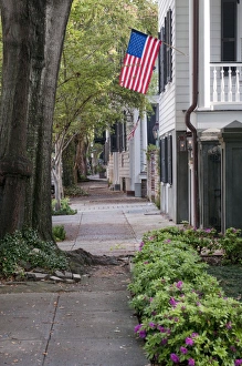 Images Dated 9th April 2010: Charleston, South Carolina, USA. A flag hangs from a house in the historic district