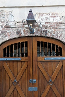 Images Dated 8th April 2010: Charleston, South Carolina, USA. Wooden door and historic brick building in downtown