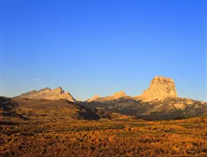 Reservation Prints: Chief Mountain and Yellow Mountains in autumn in Glacier National Park in Montana