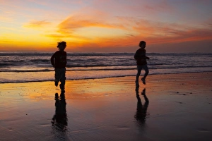 Children Prints: Children Playing on Beach at Sunset, Greymouth, West Coast, South Island, New Zealand