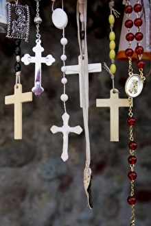 Images Dated 9th April 2009: Chimayo, New Mexico, United States. Hanging crosses and rosaries