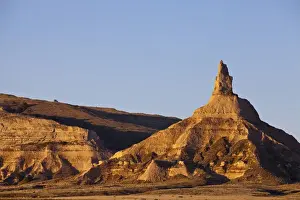 Chimney Rock Prints: Chimney Rock recieves morning sunlight near Scottsbluff, Nebraska, USA