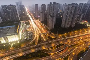 Lights Prints: China, Chongqing, High angle view of traffic on massive expressways surrounded by