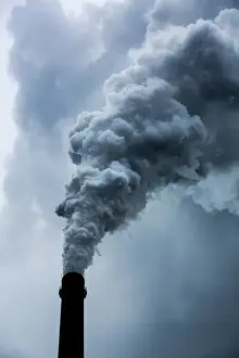 Cloudy Prints: China, Chongqing, Steam and smoke billows from smokestacks at massive coal-fired