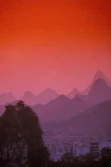 Guangxi Prints: China, Guangxi. Guilin, Solitary beauty Peak & Mountains: sunset