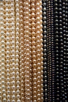 Images Dated 5th April 2009: China, Hong Kong. Kansu Jade Market. Colorful strands of freshwater pearls