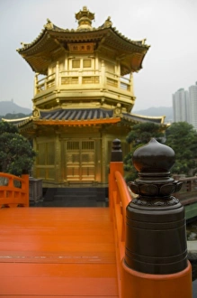 Images Dated 5th April 2009: China, Hong Kong, New Territoris. Nan Lian Garden, bright orange Zi Wu Bridge leading