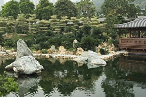 Orient Prints: China, Hong Kong, New Territoris. Nan Lian Garden, Blue Pond & rock garden