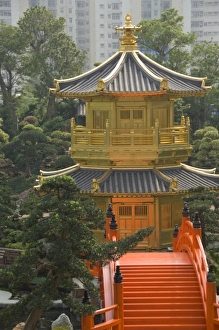 Images Dated 5th April 2009: China, Hong Kong, New Territoris. Nan Lian Garden, bright orange Zi Wu Bridge leading