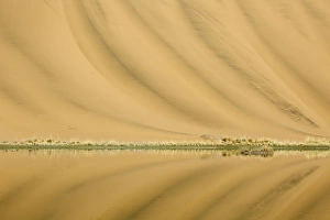 Images Dated 3rd May 2013: China, Inner Mongolia, Badan Jilin Desert. Dune patterns reflected in lake. Credit as