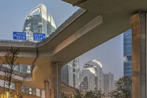 Cityscape Prints: China, Jiangsu, Nanjing. Expressway and modern buildings near Nanjing South Station