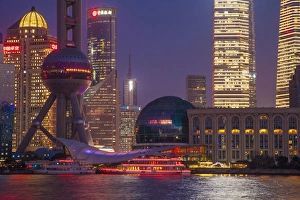 Images Dated 5th January 2014: China, Shanghai. Downtown buildings at night