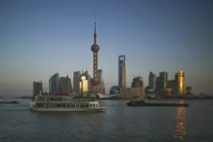 Huangpu River Prints: CHINA, Shanghai. Pudong District-Buildings of Pudong from the Huangpu River / Defocussed / Dusk