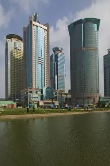 Images Dated 7th February 2008: CHINA, Shanghai. Pudong District- Pudong Highrises from Lujiazui Park Greenspace