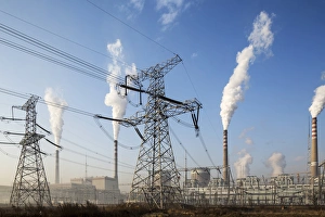 China, Shanxi Province, Datong, Steam and smoke rises from smokestacks at coal-fired Datong No