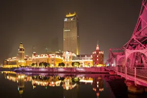 Lights Prints: China, Tianjin, Towering skyscraper above restored French Concession district along