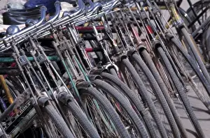 Xinjiang Prints: China, Xinjiang, Kashgar. Bicycles are parked in a sardine-like manner in Kashgar