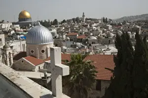 Images Dated 7th March 2015: Christian rooftop cross and silver church dome and Golden Muslim Dome of the Rock