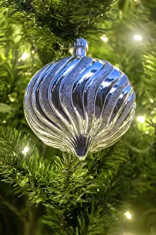 Silver Prints: Christmas ornament and lights on an artificial tree