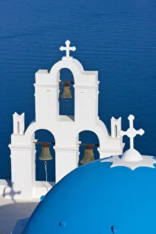 Church on the coast of Aegean Sea. Oia, Santorini Island, Greece